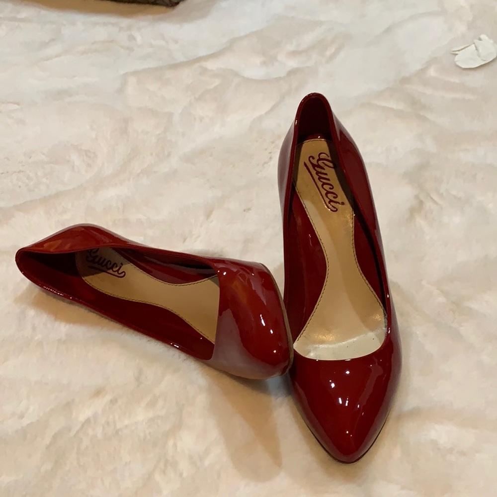 Gucci Red Patent Leather pointed toe pumps.